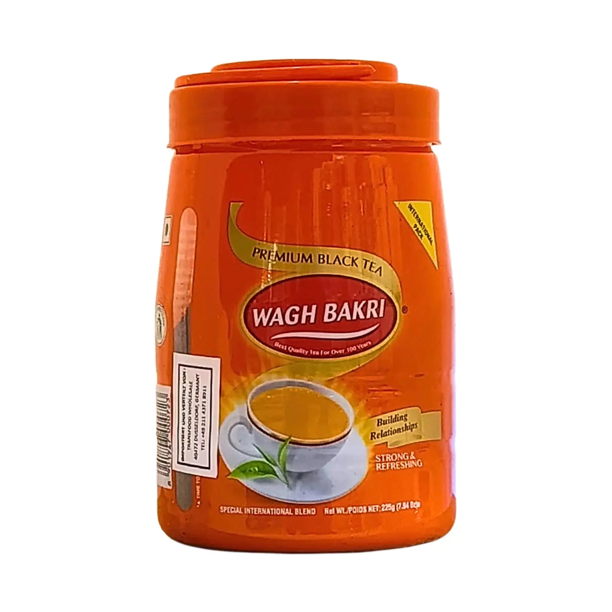 Wagh Bakri svart te 225g burk, indiskt te i orange förpackning med tekopp på etiketten.